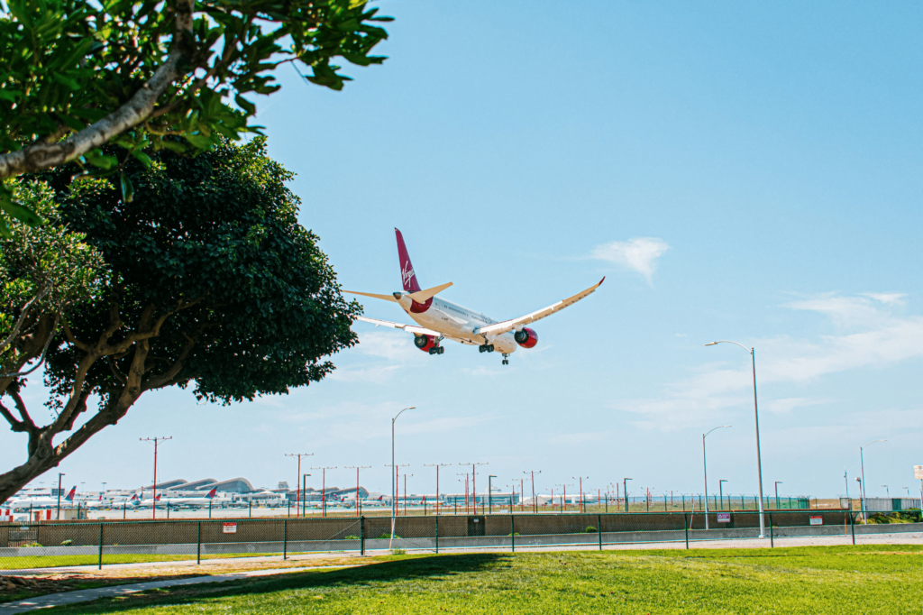 Sustainability-in-business-travel Virgin Atlantic plane about to land at LA airport